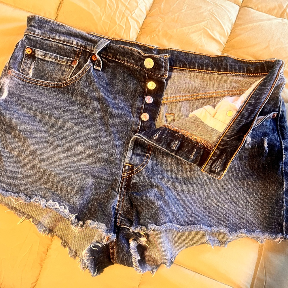 Levi’s 501 dark washed cut off denim shorts.